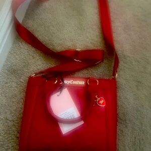 It’s a brand new dark red juicy couture purse the org price 99 I’m selling for75